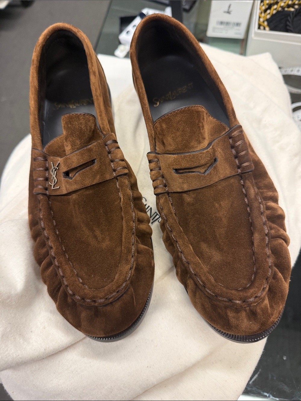 Saint Laurent Fall 2026 Suede Penny Loafers in Chestnut Brown